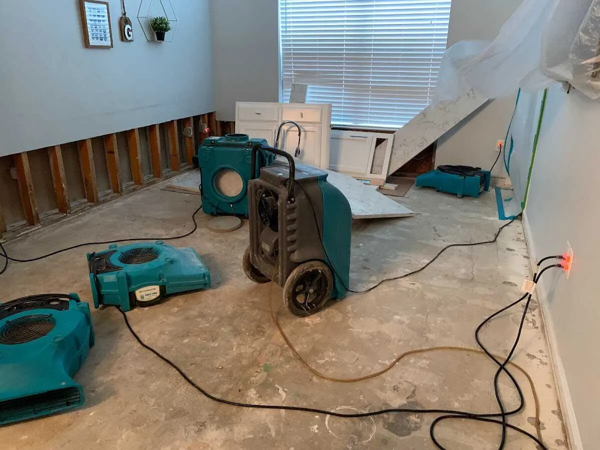 Dehumidifier in flood-cut room for Water Extraction & Removal in Cary